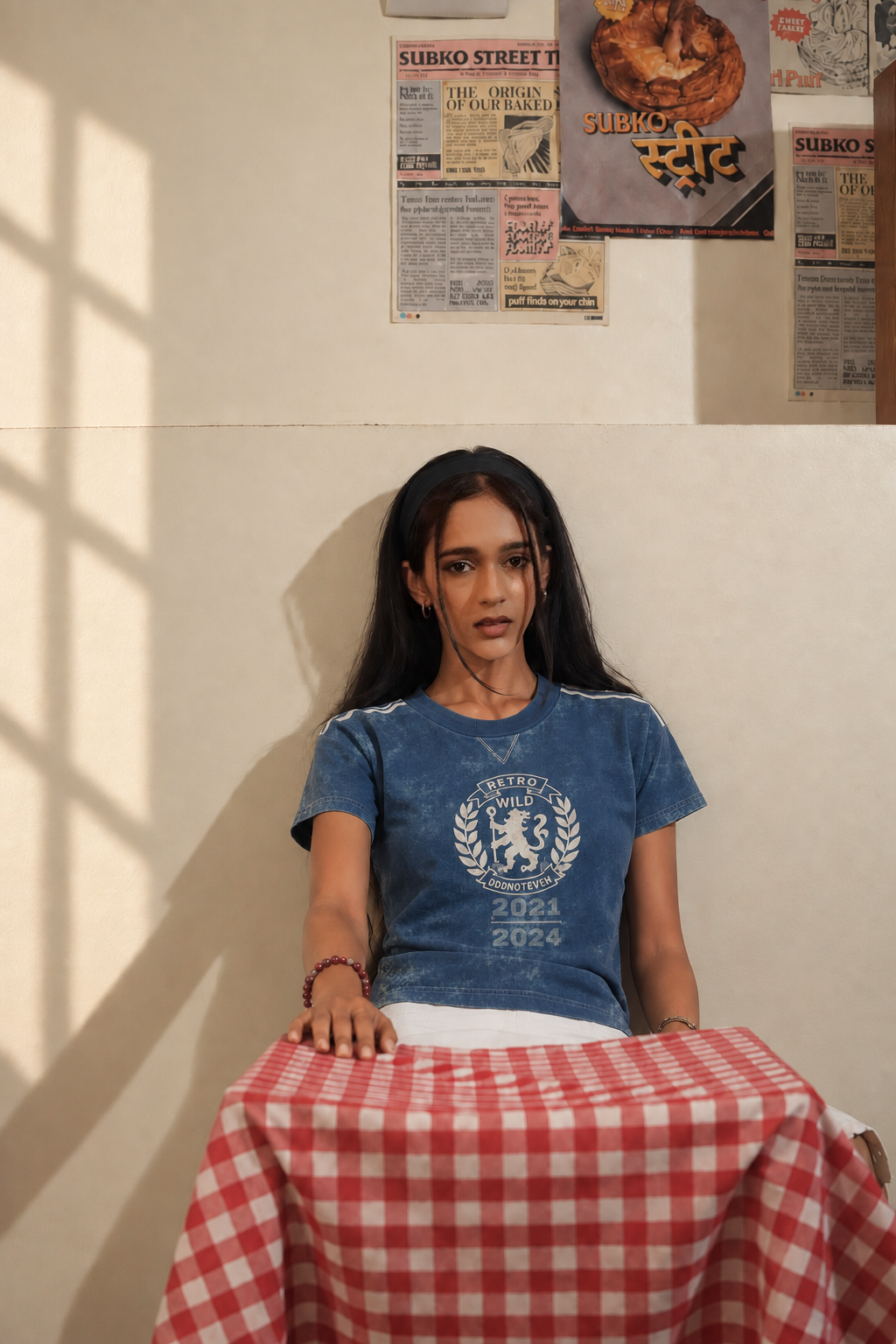 Model wearing the Blue Lions Retro Baby Tee