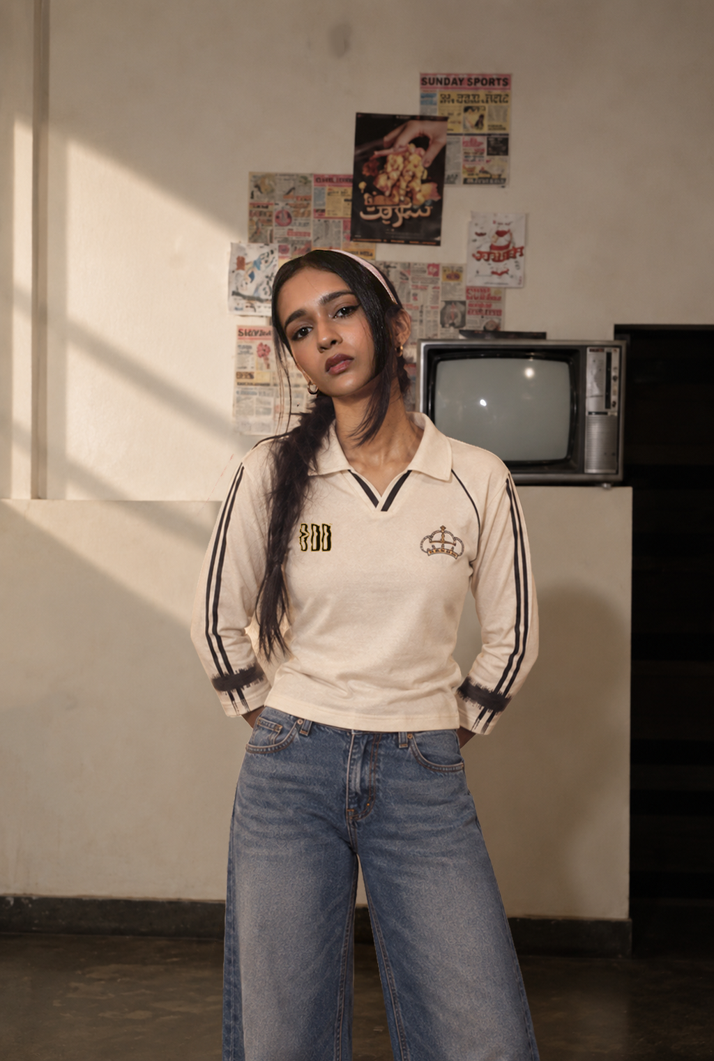 Model wearing the Crowned White Retro Baby Tee