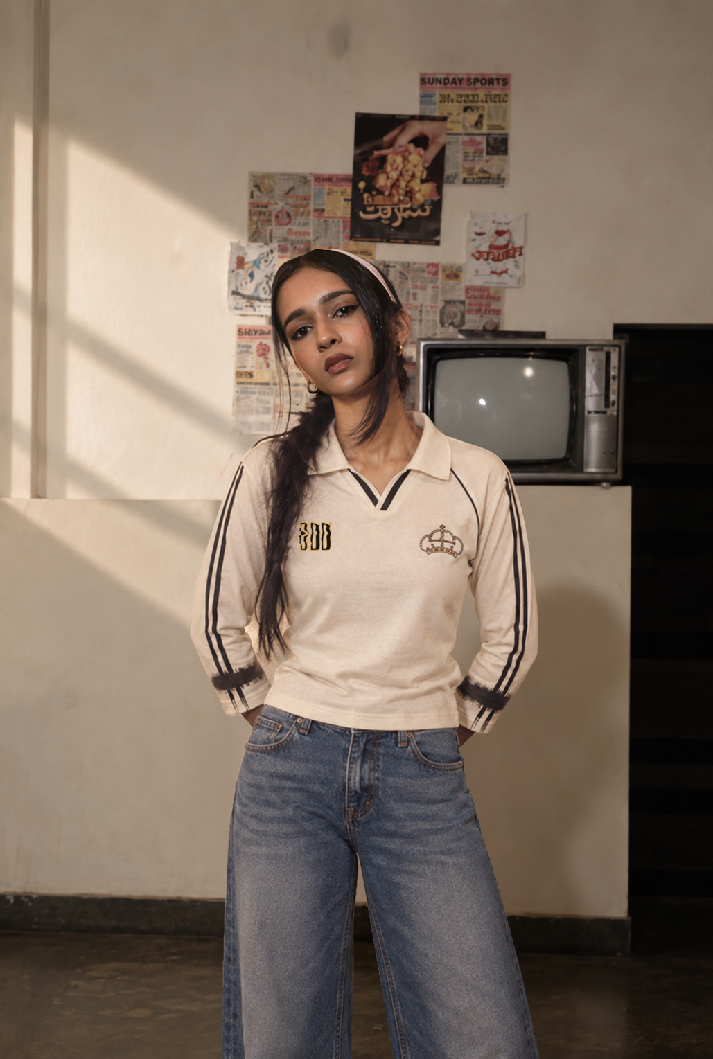Model wearing the Crowned White Retro Baby Tee