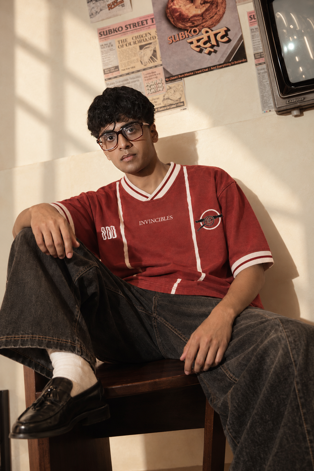 Model wearing The Gunners Retro Tee, front view